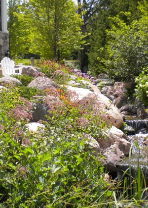 Natural flower garden with babbling brook