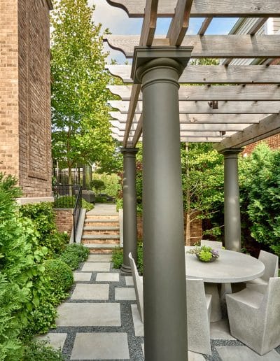 Large pergola with seating area and table