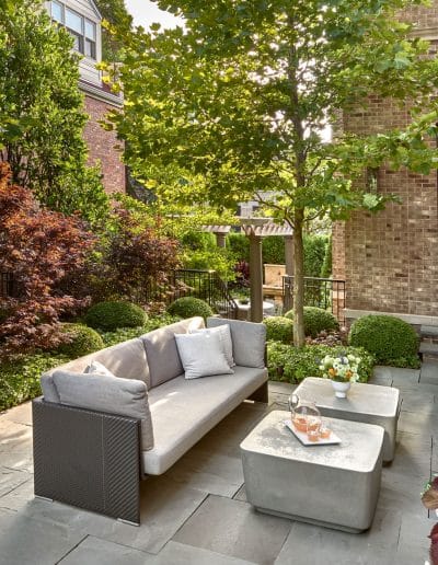 Outdoor seating in hardscape design with couch